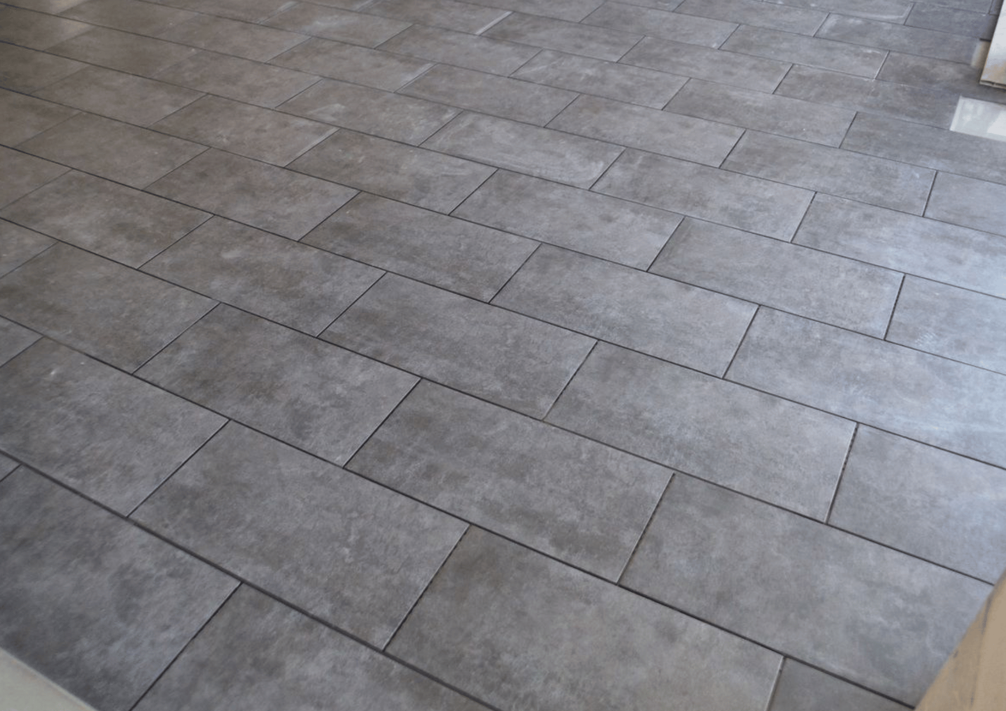 Pose de carrelage par nos équpes.